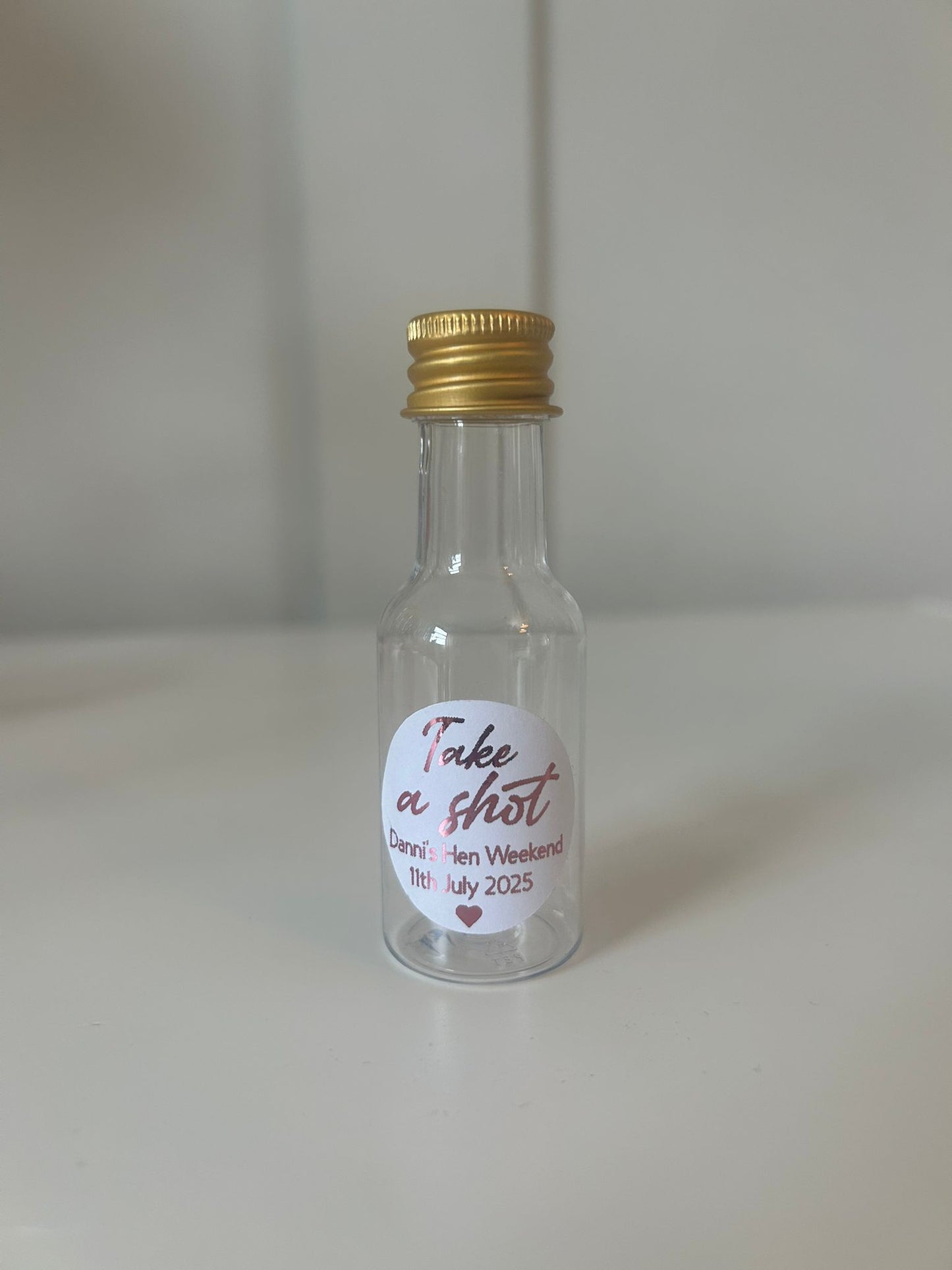 Shot bottles with stickers
